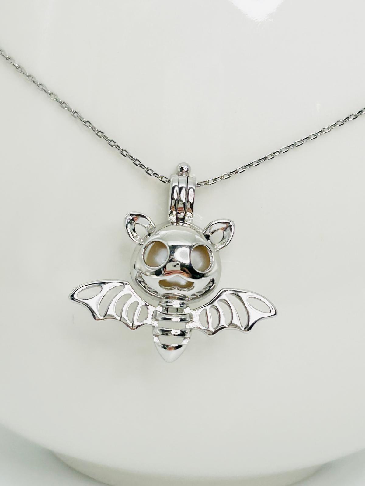 Bat Pendant with Hidden Pearl – Unique Jewellery Design | Singapore