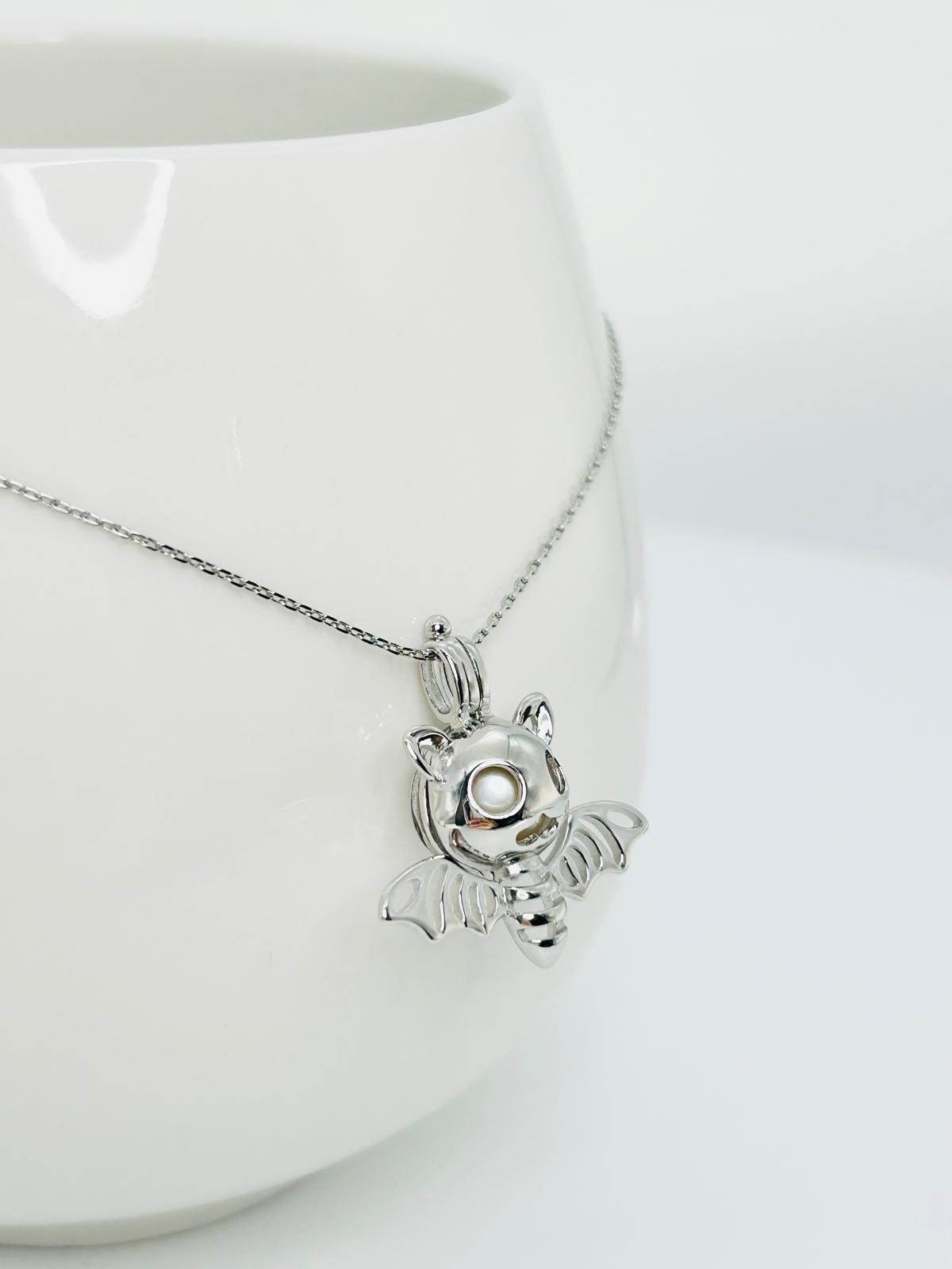 Bat Pendant with Hidden Pearl – Unique Jewellery Design | Singapore